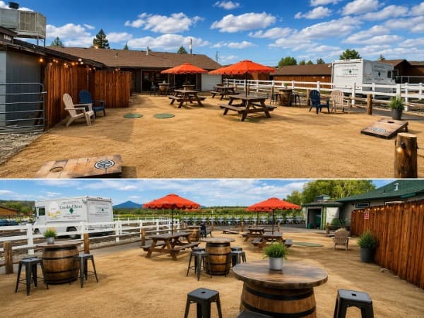The Crooked Cowboy patio — picnic tables under red umbrellas, whiskey-barrel tables with stools, cornhole boards and string lights, with the Cascades on the horizon